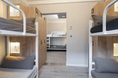 a dorm room with bunk beds in it at Albergue Alda Pilgrim Ponferrada in Ponferrada