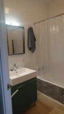 a bathroom with a sink and a shower at Foz Playas in Foz