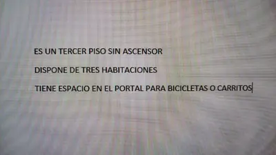 a view of a text message on a laptop screen at Foz Playas in Foz