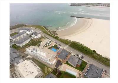 an aerial view of a beach and the ocean at Apartamento en Playa Rapadoira in Foz