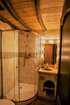 a bathroom with a shower and a sink at Fogar de Breogán in Pontevedra