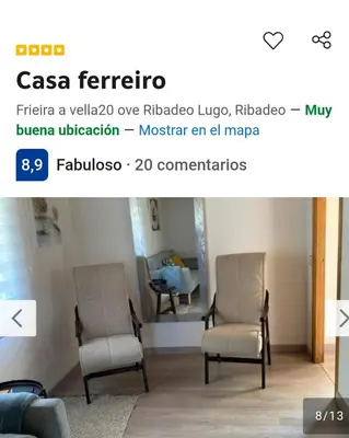 a screenshot of a living room with two chairs at Casa ferreiro in Ribadeo