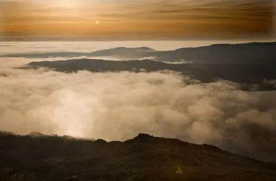a view of a mountain with clouds in the sky at HOTEL RST. PADORNELO in Padornelo