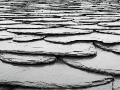 a slate roof is shown in black and white at El Vallín de Alba in La Artosa