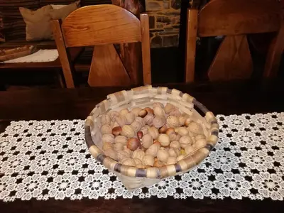 a basket of balls sitting on a table at Pajar in Braña