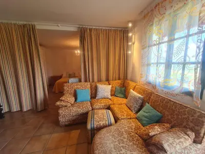 a living room with a couch and a window at Castelodobispo - Ourense in Sobrado del Obispo