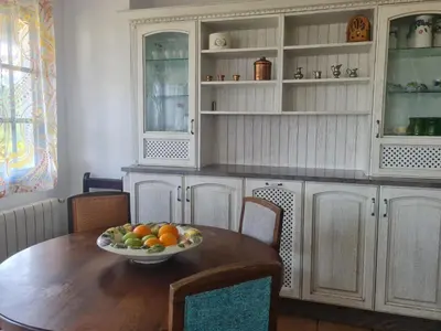 a kitchen with a table with a bowl of fruit on it at Castelodobispo - Ourense in Sobrado del Obispo