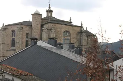 an old building with a roof in front of it at Hostal Burbia in Villafranca del Bierzo