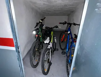 three bikes are parked in a small room at Estudio céntrico 1 con terraza y parking privado in Ourense