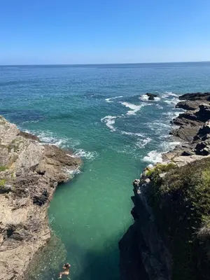 a view of the ocean from a cliff at Apartamento vacacional foz in Foz