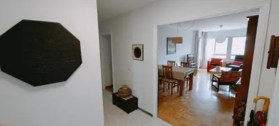 a view of a living room and a dining room at Piso luminoso y acogedor en primera línea de playa Covas Viveiro in Vivero