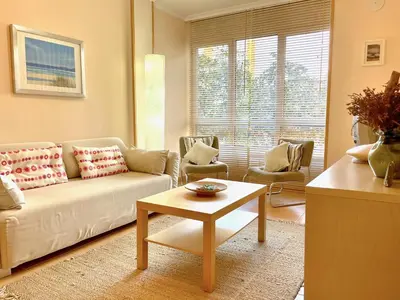 a living room with a couch and a table at The Cliffs - Mansión del Indiano I in Viveiro
