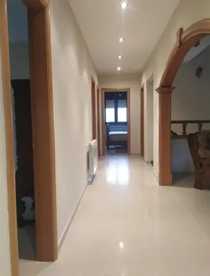 a hallway of a house with a room with a hallway at As Pias in Pontevedra