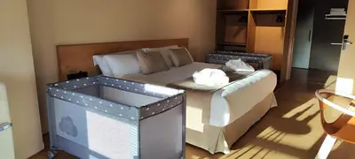 a living room with a couch and a bed at ACOUGA Hotel Boutique in Celanova