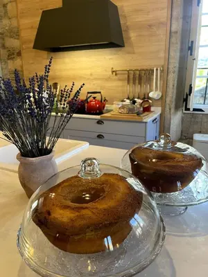 two cakes on a counter in a kitchen at Casa Grande de Láncara in Lugo