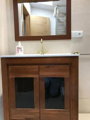 a bathroom with a sink and a mirror at Casa Cea in Melide