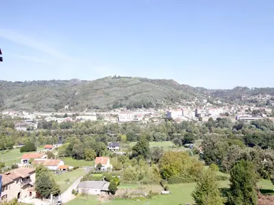 a view of a town with a hill in the background at CASA MIRADOR REZA Alojamiento Termas in Ourense