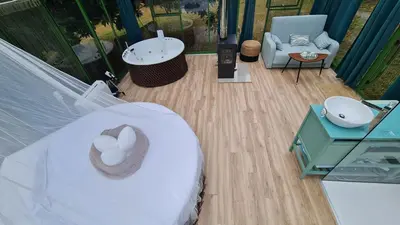 a room with a bed and a tub and a sink at REMANSO DE TRASFONTAO_Nido 360° in Silleda