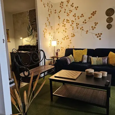 a living room with a couch and a table at Casa San Pablo in Melide