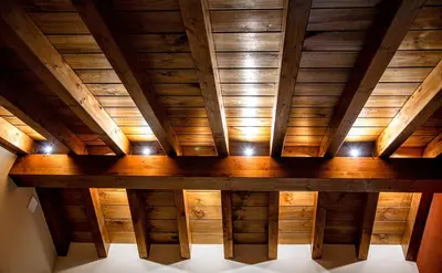 an overhead view of a wooden ceiling with lights at Lagunas de Sanabria in Trefacio