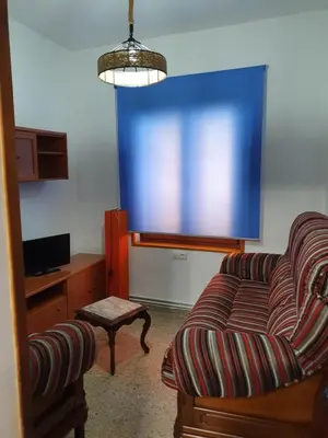 a living room with a couch and a table at Casa Celedonio in Cerredo