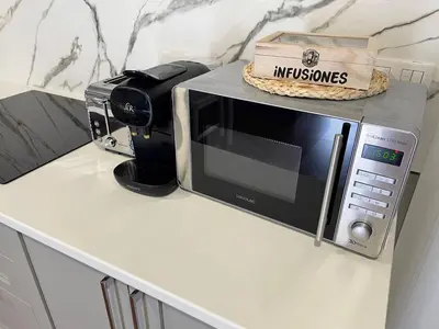 a microwave sitting on top of a counter at Casa de Fernando in Tríacastela