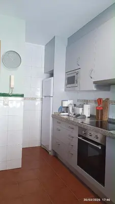 a bedroom with a bed and a window at Duplex acogedor CAMINO INGLÉS a 10 min de Santiago in Sigüeiro