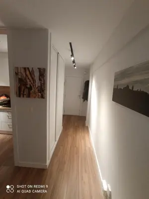 an empty room with white walls and wooden floors at Precioso loft a 600m de la catedral in Santiago de Compostela