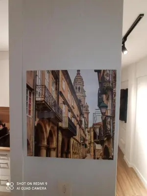 a picture of an old city on a wall at Precioso loft a 600m de la catedral in Santiago de Compostela