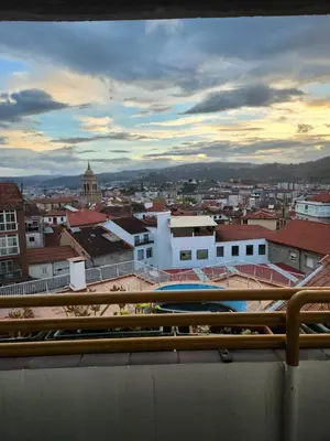a view of a city from the roof of a building at Estudio con vistas a la ciudad in Ourense