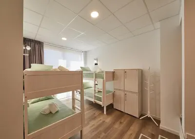 a dorm room with bunk beds in it at ALBERGUE SEGUE O CAMIÑO in Sigüeiro