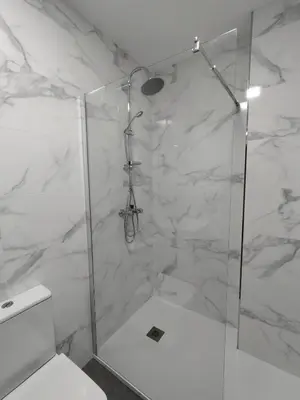 a bathroom with a shower and a toilet at HORIZON in Arzúa