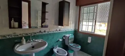 a bathroom with a sink and a toilet at Casa da Buxeira . Entorno magico. in Caritel