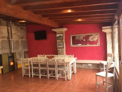 a dining room with a table and chairs at House - 4 Bedrooms with Pool - 4093 in A Estrada