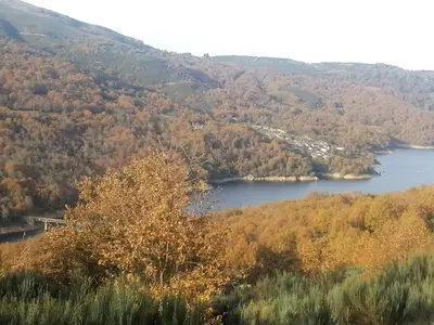 a view of a lake in the mountains at PENSIÓN RÚSTICA SANTA MARIÑA DA PONTE in Santa Marina del Puente