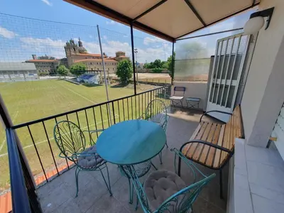 a balcony with a table and chairs and a view at Acea Nova 3 in Monforte de Lemos