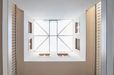 a room with a large window in the ceiling at Hotel Crunia I A Coruña in A Coruña