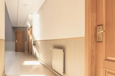 a hallway of a hospital with a hallway at Hotel Crunia I A Coruña in A Coruña