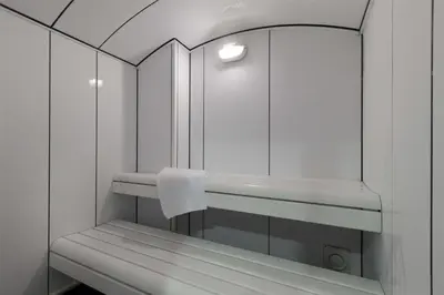a white bathroom with a sink and a mirror at NH Collection Santiago de Compostela in Santiago de Compostela