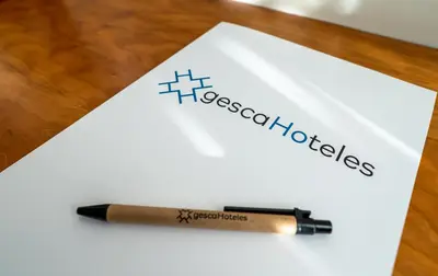 a pen sitting on top of a piece of paper at Hotel Ciudad de Compostela in Santiago de Compostela