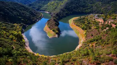 an aerial view of a river in a valley at Piso Estación Termal II in Ourense