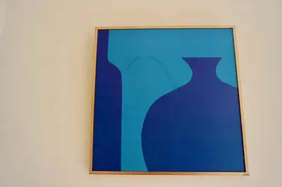a picture of a blue vase on a wall at La Furmumecha in Villablino