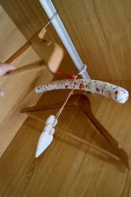 a toy umbrella on a wooden floor at La Furmumecha in Villablino