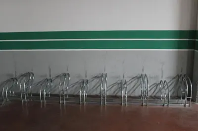 a row of empty glass frames against a wall at Hotel El Castillo in Ponferrada