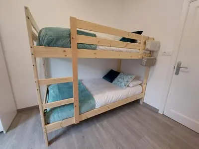 a couple of bunk beds in a room at Acea Nova 1 in Monforte de Lemos