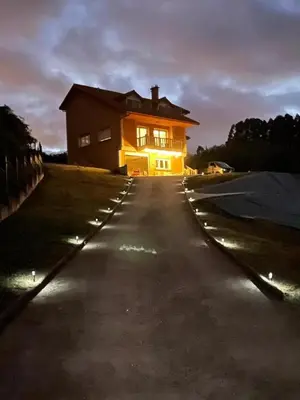 a house sitting on the side of a road at CASA FONTE DA PEDREIRA in Sada