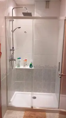 a shower with a glass door in a bathroom at Loft Plaza Mayor in Ourense