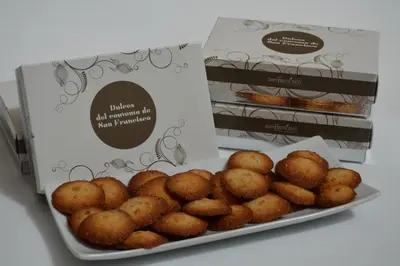 a plate of dallas all american food network muffins at San Francisco Hotel Monumento in Santiago de Compostela