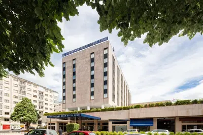 a rendering of a hotel building with cars parked in front at Eurostars Gran Hotel Lugo in Lugo