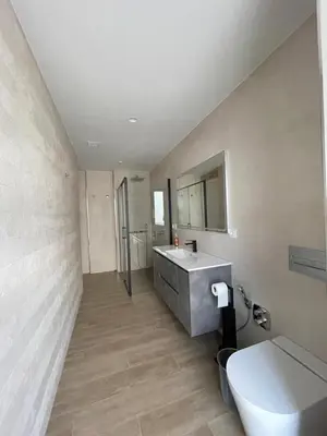 a bathroom with a sink and a toilet at El Roble 9 in Astorga